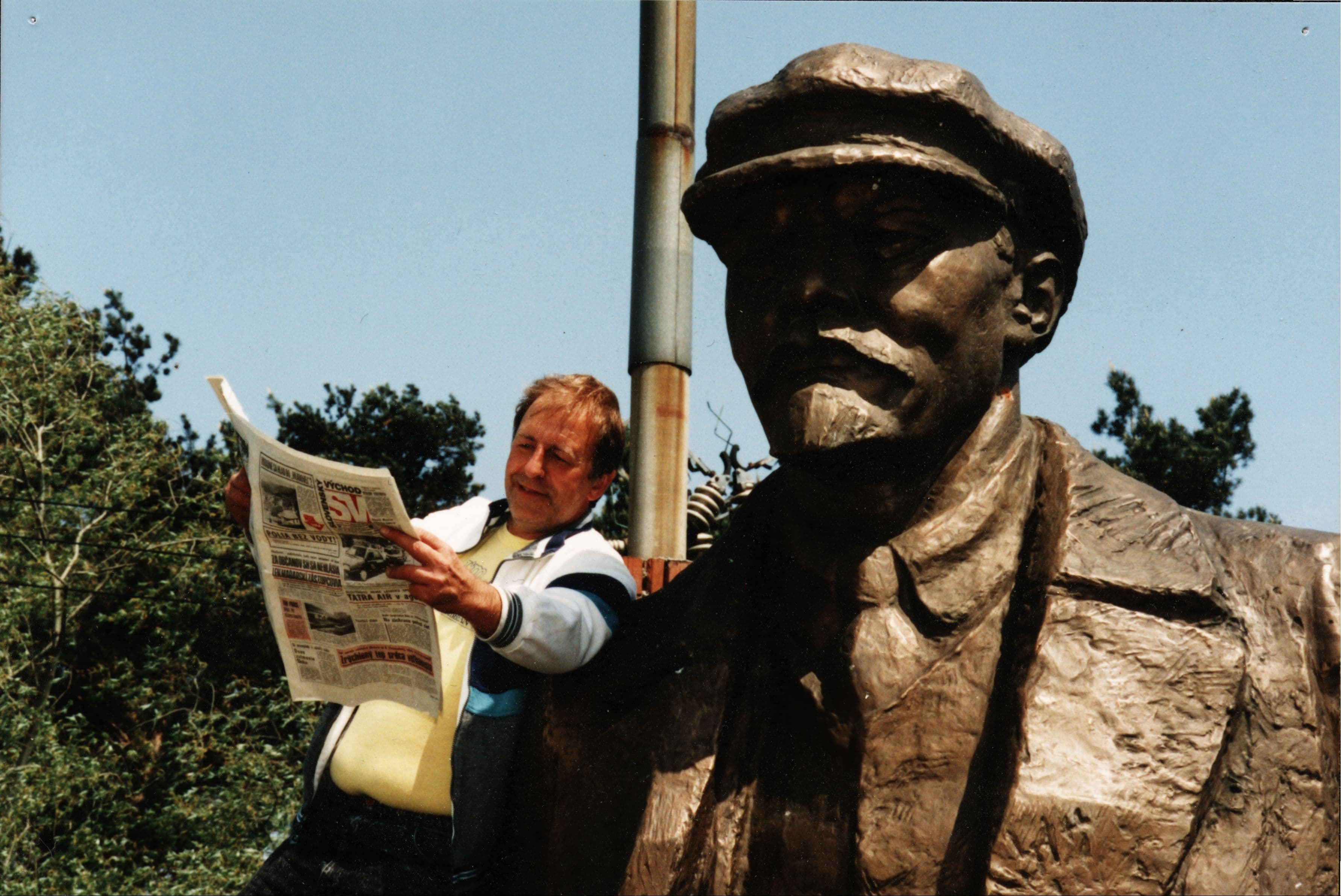 Lew reading a story about his Lenin in a local paper called Slovenský východ Lew reading a story about his Lenin in a local paper called Slovenský východ