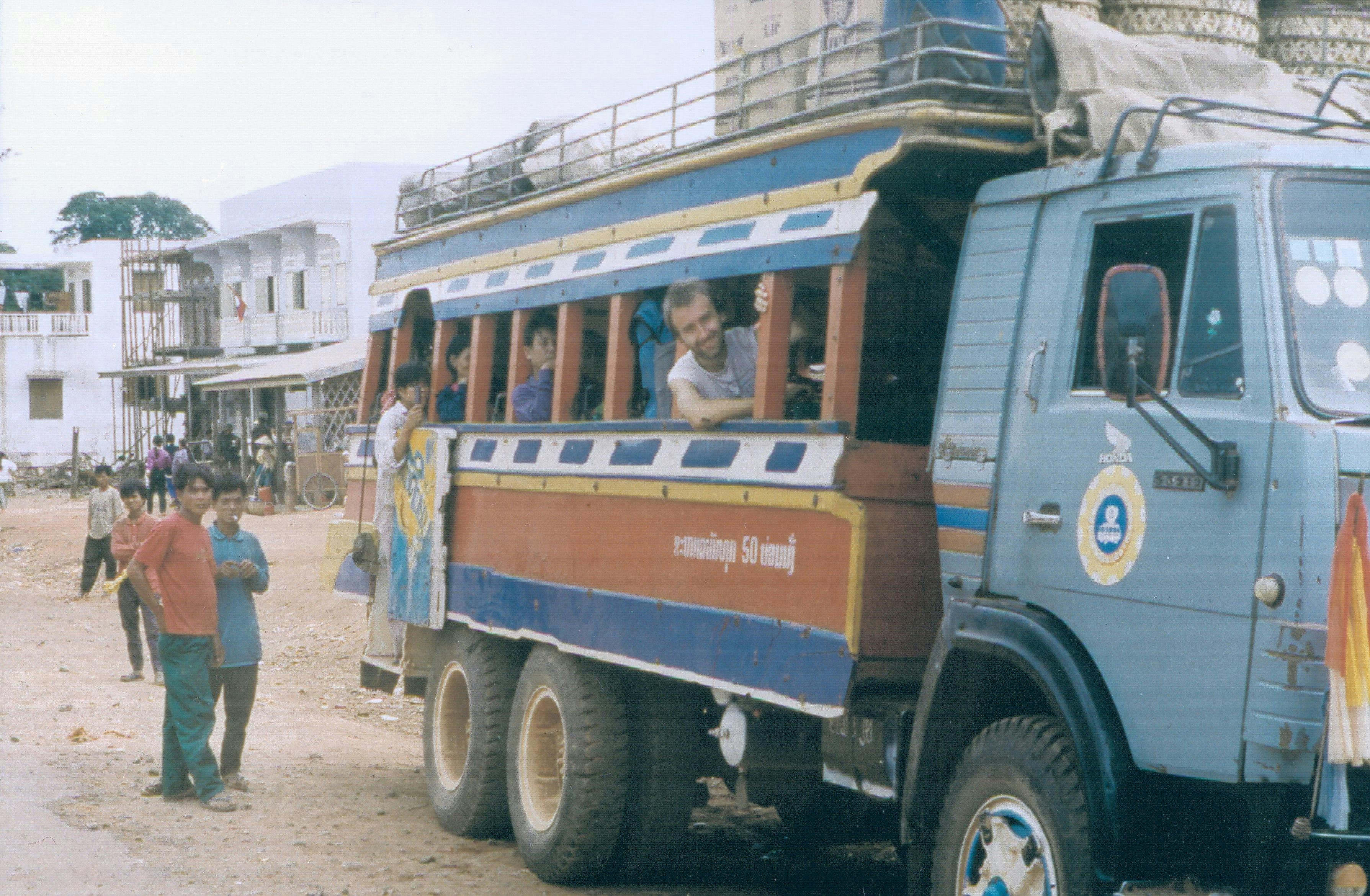 Boarding a truck-turned-bus in Laos (1994)