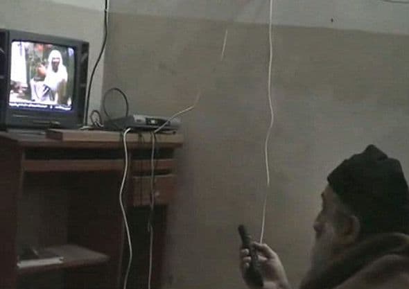 Frail old man watching himself on TV Frail old man watching himself on TV