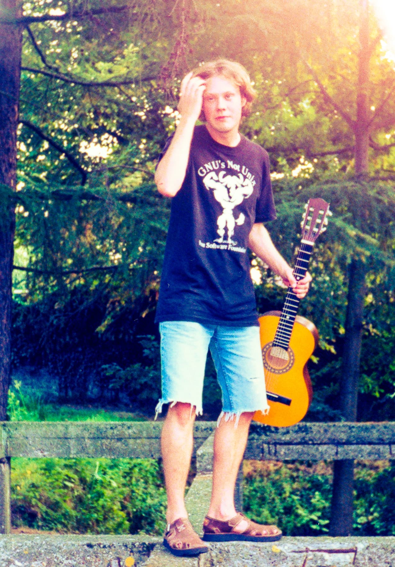 Philippe wearing his signature T-shirt, guitar in hand Philippe wearing his signature T-shirt, guitar in hand